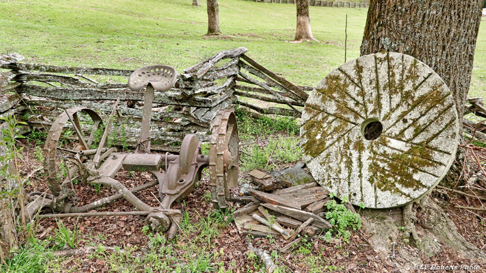 Hay_mower_and_millstone